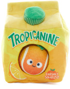 juice carton dog toy with smiling orange tennis ball